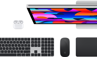 Mac accessories: AirPods, Studio Display, Black Magic Keyboard with Touch ID, Black Magic Mouse, and Black Magic Trackpad